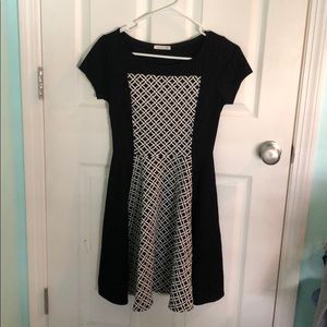 Black dress with embodiments